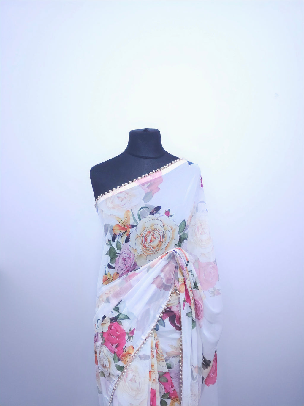 Blue Georgette Saree – Floral Design & Pearl Border