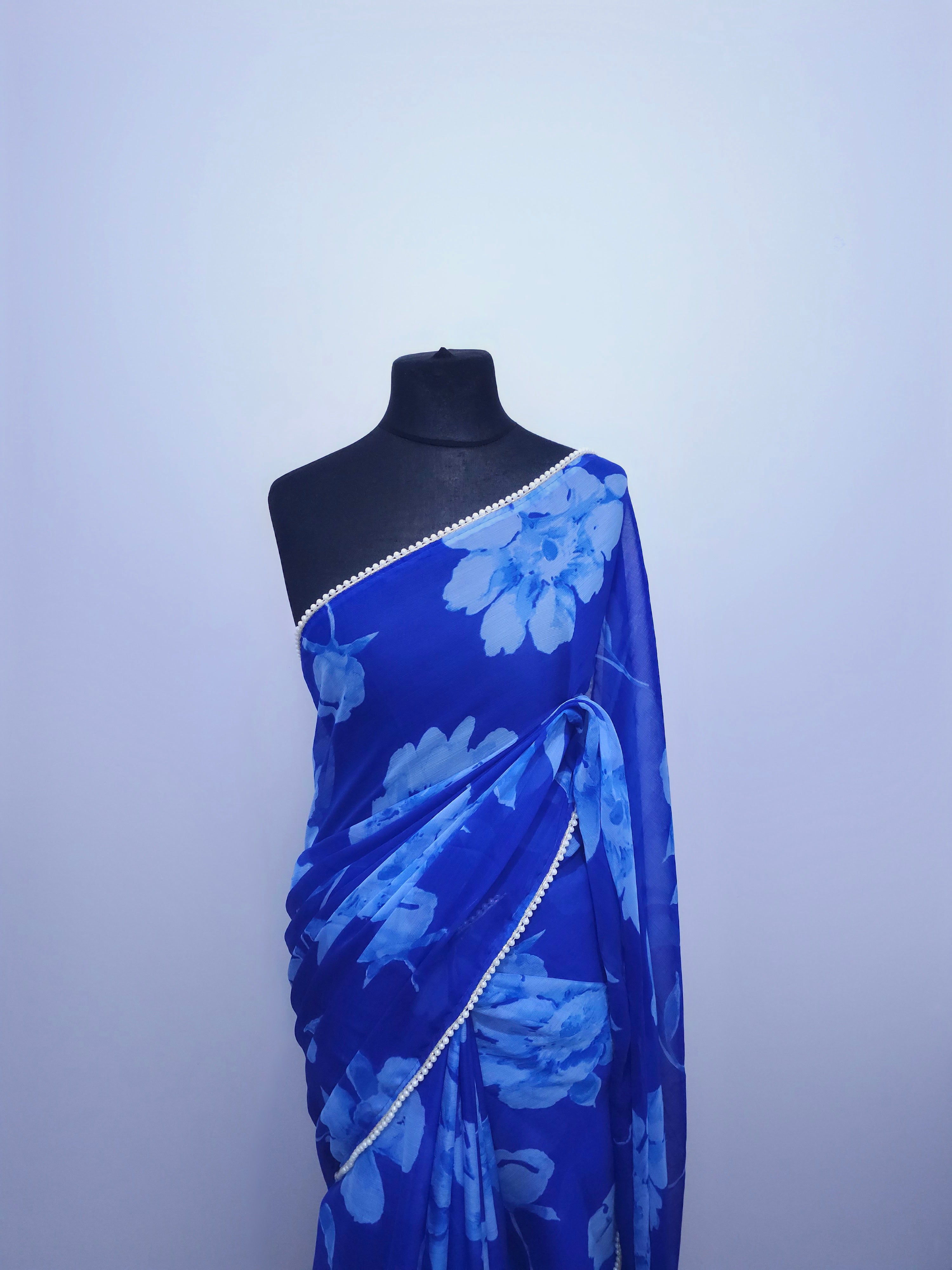 Purple Floral Georgette Saree – Pearl Bead Border